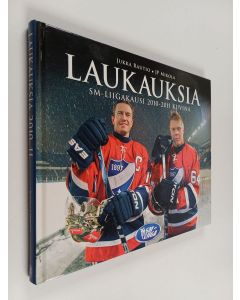 Kirjailijan Jukka Rautio & JP Mikola käytetty kirja Laukauksia 2010-2011 : SM-liigakausi 2010-2011 kuvina
