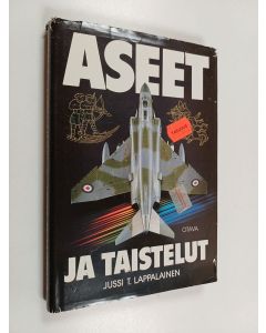 Kirjailijan Jussi T. Lappalainen käytetty kirja Aseet ja taistelut - sotataidon kolme vuosituhatta