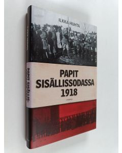Kirjailijan Ilkka Huhta käytetty kirja Papit sisällissodassa 1918