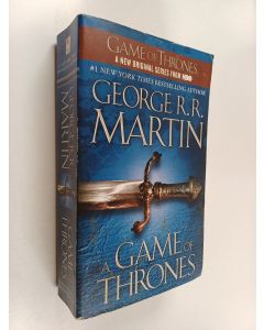Kirjailijan George R. R. Martin käytetty kirja A game of thrones