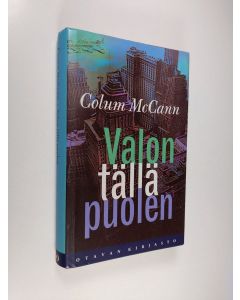 Kirjailijan Colum McCann käytetty kirja Valon tällä puolen