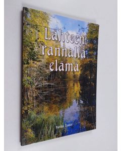 Kirjailijan Marika Tudeer käytetty kirja Lähteen rannalla elämä