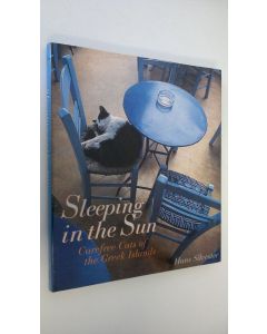 Kirjailijan Hans Silvester käytetty kirja Sleeping in the Sun : Carefree cats of the Greek Islands (ERINOMAINEN)