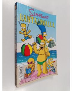 Kirjailijan Matt Groening käytetty kirja Simpsonit rantalomalla