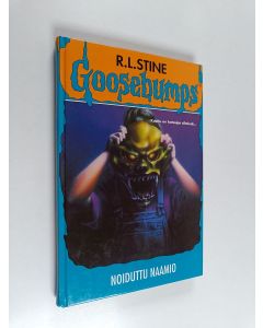 Kirjailijan R. L Stine käytetty kirja Noiduttu naamio