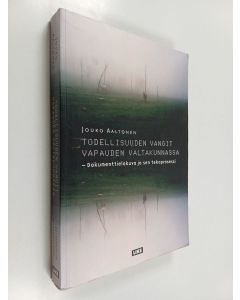 Kirjailijan Jouko Aaltonen käytetty kirja Todellisuuden vangit vapauden valtakunnassa : dokumenttielokuva ja sen tekoprosessi