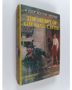 Kirjailijan Margaret Sutton käytetty kirja The secret of the sand castle
