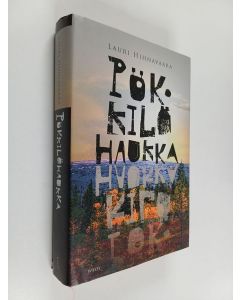 Kirjailijan Lauri Hihnavaara käytetty kirja Pökkilöhaukka : veijaritarina Lapin aavoilta