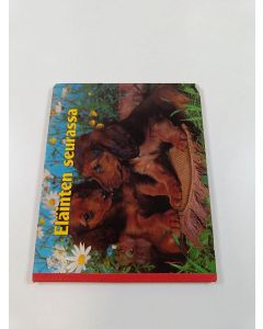 käytetty kirja Eläinten seurassa
