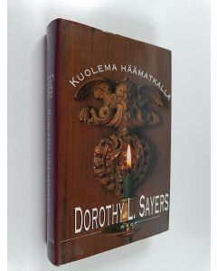 Kirjailijan Dorothy L. Sayers käytetty kirja Kuolema häämatkalla