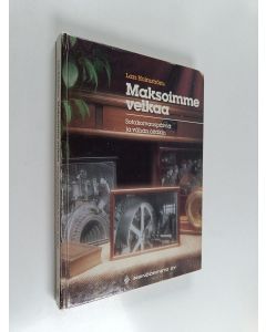 Kirjailijan Lars Holmström käytetty kirja Maksoimme velkaa : sotakorvauspäiviä ja vähän öitäkin