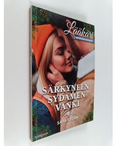Kirjailijan Sara Storm käytetty kirja Lääkäri 12/2022 : Särkyneen sydämen vanki