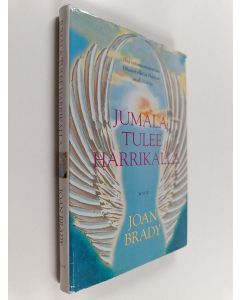 Kirjailijan Joan Brady käytetty kirja Jumala tulee harrikalla