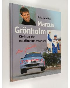 Kirjailijan Petteri Äikäs käytetty kirja Ralliautoilija Marcus Grönholm - kivinen tie maailmanmestariksi