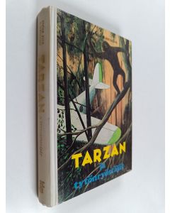 Kirjailijan Edgar Rice Burroughs käytetty kirja Tarzan ja tytönryöstäjät