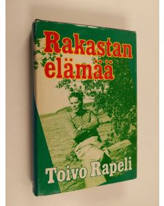 Kirjailijan Toivo Rapeli käytetty kirja Rakastan elämää