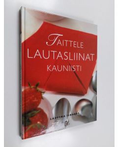 Kirjailijan Labeena Ishaque käytetty kirja Taittele lautasliinat kauniisti