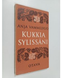 Kirjailijan Anja Vammelvuo käytetty kirja Kukkia sylissäni