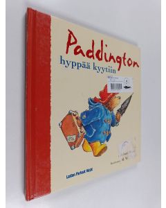 Kirjailijan Michael Bond käytetty kirja Paddington hyppää kyytiin