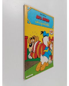 Kirjailijan Walt Disney käytetty kirja Aku Ankan väripaletti