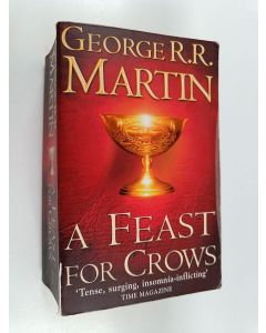 Kirjailijan George R.R. Martin käytetty kirja A feast for crows