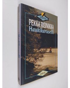 Kirjailijan Pekka Reinikka käytetty kirja Haukikaruselli (ERINOMAINEN)