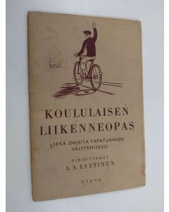 Kirjailijan Aarne Armas Lyytinen käytetty teos Koululaisen liikenneopas sekä ohjeita tapaturmien välttämiseksi