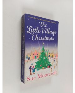 Kirjailijan Sue Moorcroft käytetty kirja The Little village Christmas