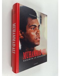 Kirjailijan Thomas Hauser käytetty kirja Muhammad Ali : suurin ja kaunein