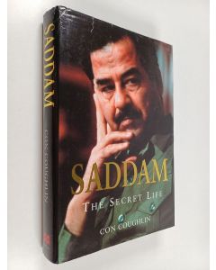 Kirjailijan Con Coughlin käytetty kirja Saddam : the secret life