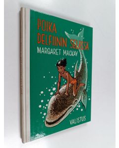 Kirjailijan Margaret Mackay käytetty kirja Poika delfiinin selässä : kertomus Havaijilta