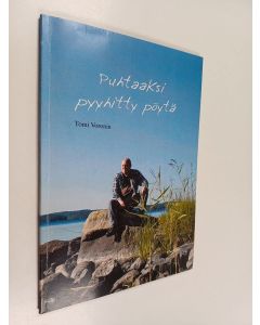 Kirjailijan Tomi Voronin käytetty kirja Puhtaaksi pyyhitty pöytä