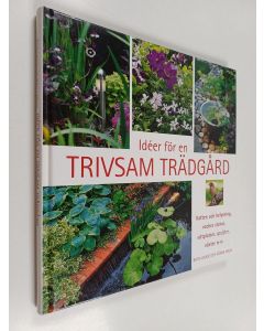 Kirjailijan Britt-Louise Malm käytetty kirja Idéer för en trivsam trädgård : vatten och belysning, vackra stenar, sittplatser, spaljéer, växter m.m.