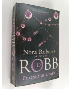 Kirjailijan Nora Roberts käytetty kirja Portrait in death