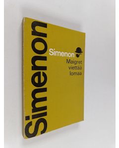 Kirjailijan Georges Simenon käytetty kirja Maigret viettää lomaa