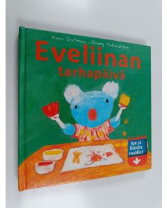 Kirjailijan Anne Gutman käytetty kirja Eveliinan tarhapäivä