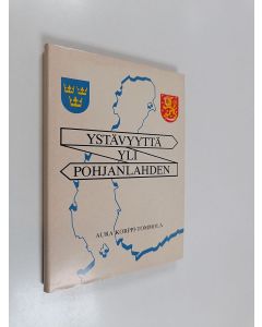 Kirjailijan Aura Korppi-Tommola käytetty kirja Ystävyyttä yli Pohjanlahden : Ruotsin ja Suomen välinen kummikuntaliike 1942-1980