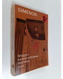 Kirjailijan Georges Simenon käytetty kirja Maigret kansainvälisessä seurassa