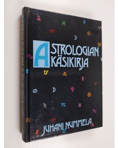 Kirjailijan Juhani Nummela käytetty kirja Astrologian käsikirja