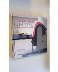 Kirjailijan Judith Wilson käytetty kirja Sisustamisen uusi tyyli