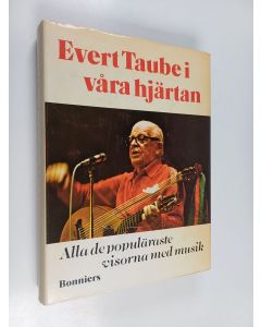 Kirjailijan Evert Taube käytetty kirja Evert Taube i våra hjärtan : alla de populäraste visorna med musik