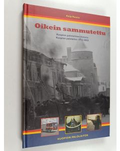 Kirjailijan Kaija Vuorio käytetty kirja Oikein sammutettu : Kuopion palotoimen historia ; Kuopion palolaitos 1913-2003
