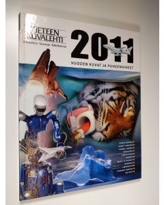 käytetty kirja Vuoden kuvat ja puheenaiheet 2011