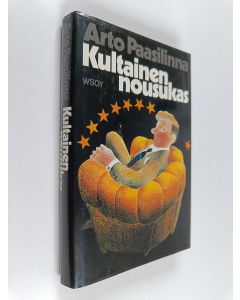 Kirjailijan Arto Paasilinna käytetty kirja Kultainen nousukas