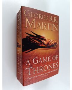 Kirjailijan George R. R. Martin käytetty kirja A Game of Thrones