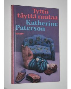 Kirjailijan Katherine Paterson käytetty kirja Tyttö täyttä rautaa