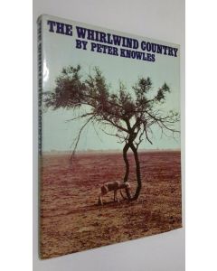 Kirjailijan Peter Knowles käytetty kirja The Whirlwind Country