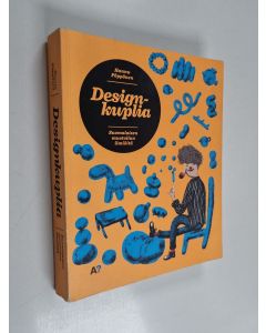 Kirjailijan Hannu Pöppönen käytetty kirja Designkuplia - suomalaisen muotoilun ilmiöitä