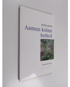 Kirjailijan Veli-Matti Mathlin käytetty kirja Aamun Kolme Hetke