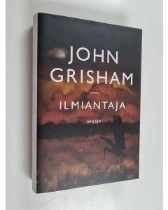 Kirjailijan John Grisham käytetty kirja Ilmiantaja